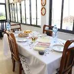 Ab בית הארחה